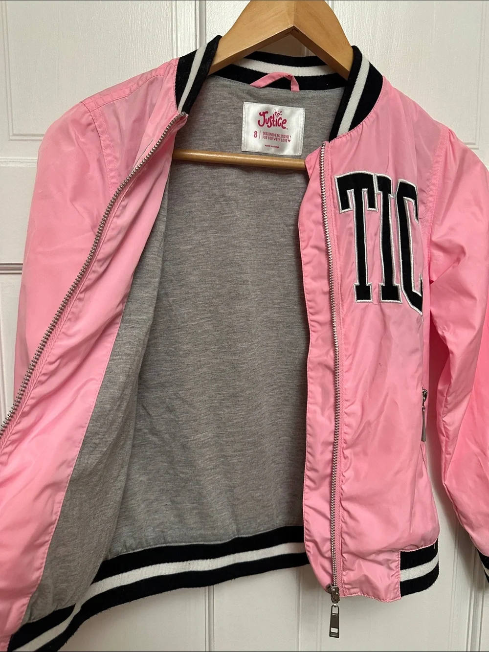 Justice Pink Varsity-Style Bomber Jacket with Black Trim